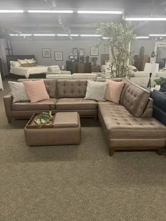 Pottery barn brown leather sectional couch and ottman