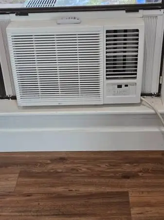 LG Cooling/Heating window unit with remote & curtain panels