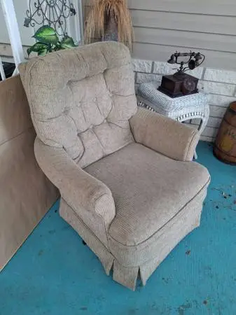 Upholstered rocking armchair