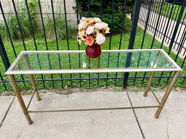 Hollywood Regency console/ sofa table metal and glass top