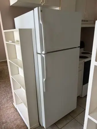 GE fridge works good $150.00