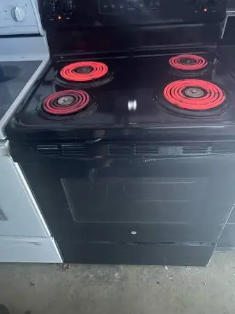 Refrigerator Freezer/ice maker/by GE/Black&Stove Range Oven