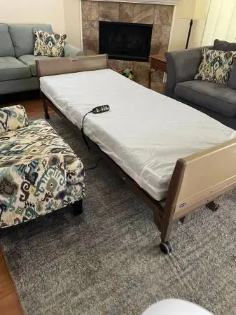 OKIMAT II Electric hospital bed. With New matres s