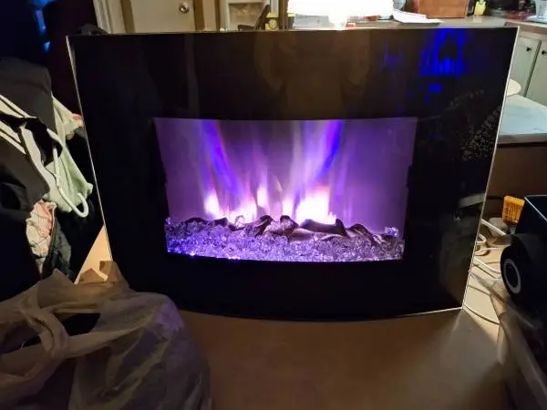 Faux fireplace with space heater