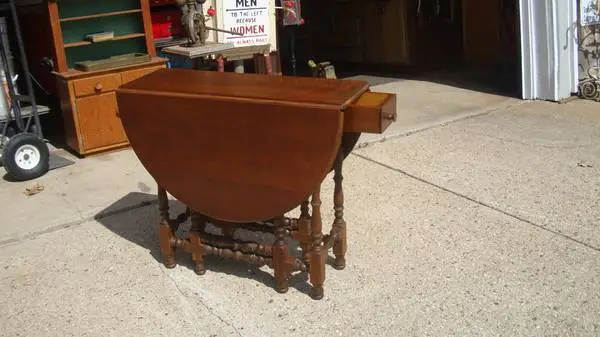 vintage Gateleg table with deep drawer not sure what wood it is