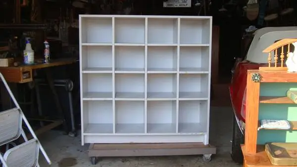 2 sided formica face  free standing storage cab adj shelves