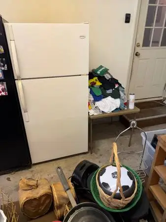 Two white refrigerators in very good condition