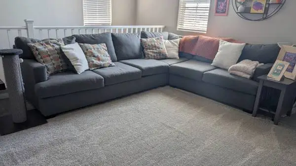 Living Spaces Sectional Couch with Queen Pullout Bed