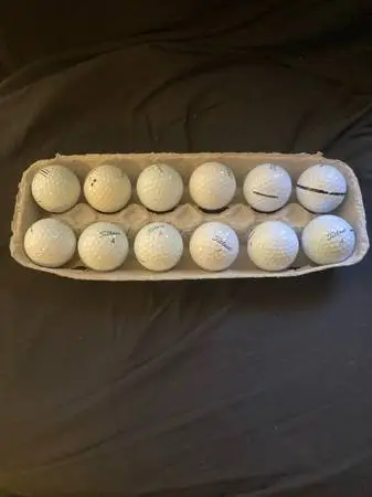 1 dozen Titleist golf balls