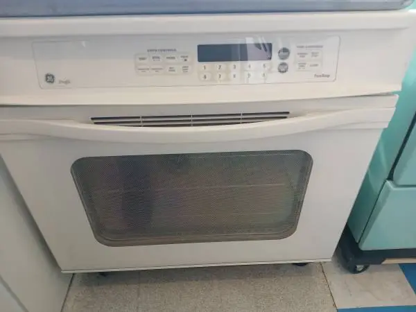 ~~~~~~> GE electric wall oven & gas cooktop combo, bisq.