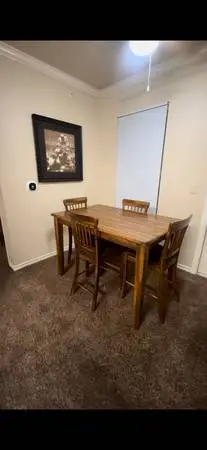 Counter/bar height Table w/(6) chairs.  Expandable