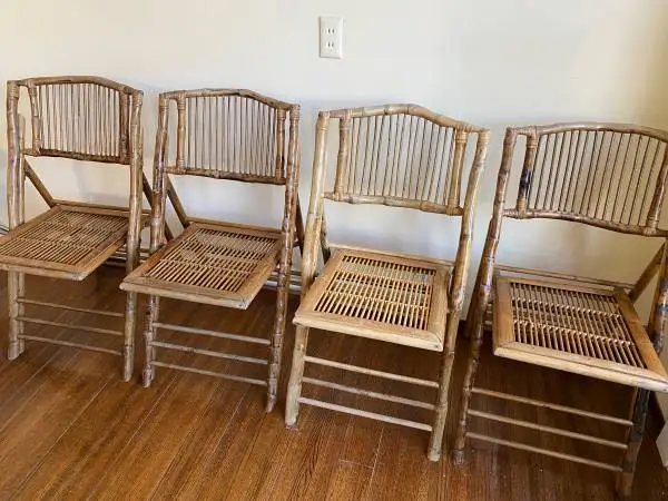 Set of four folding bamboo chairs