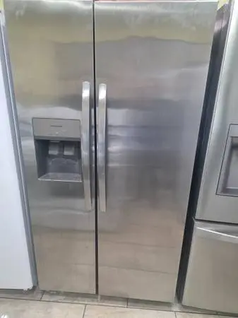 FRIGIDAIRE STAINLESS STEEL SIDE BY SIDE REFRIGERATOR