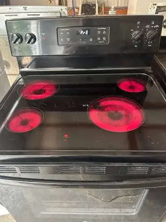 Like new ge glass top stove