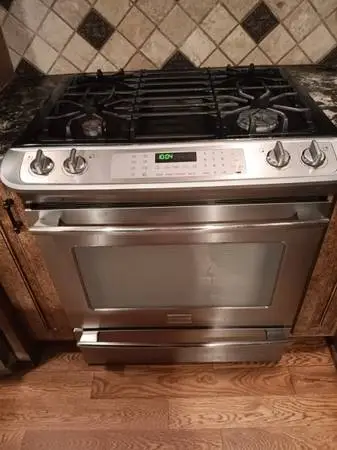 Stainless steel Frigidaire slide-in gas stove