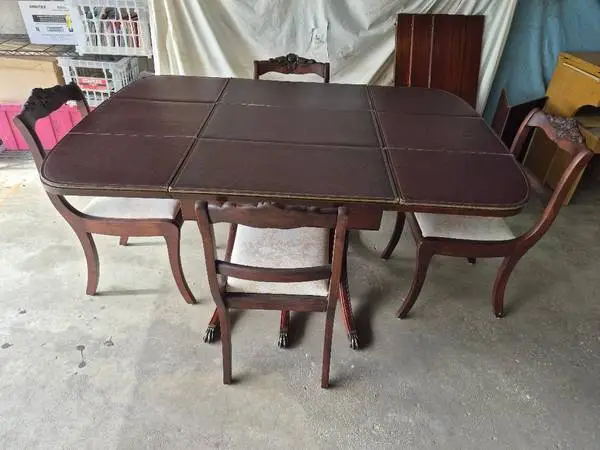 Duncan Phyfe table&3 Leaves-$95- 4 Chairs-$95- Pads $45