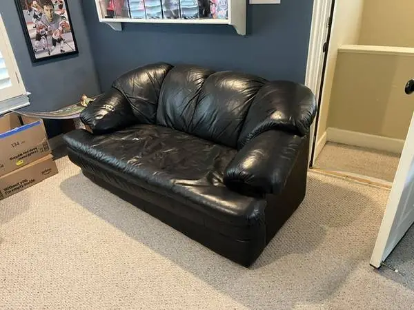 Black Leather couch/love seat