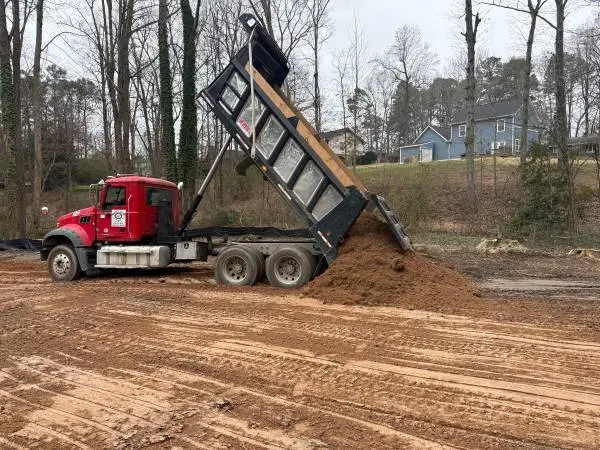 Fill Dirt multiple loads at 10 load minimum we also spread & compact