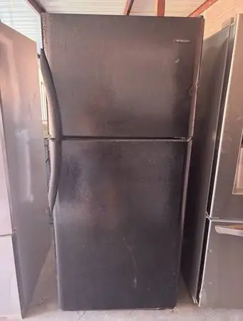 Black Frigidaire Refrigerator And Freezer