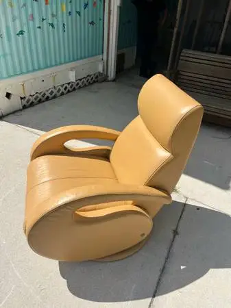 American leather modern recliner swivels rocks