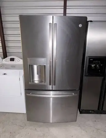 GE Stainless Steel Refrigerator And Freezer