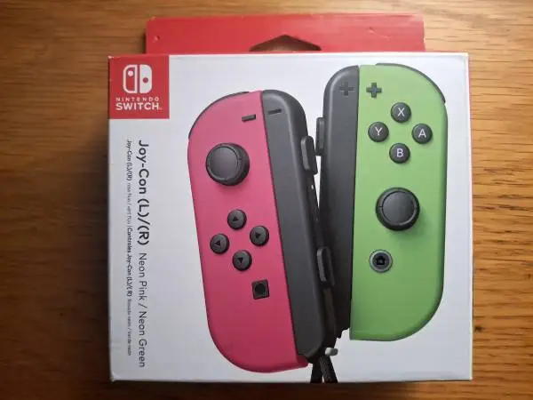 **NEW/SEALED** Genuine Nintendo Switch Joy-Cons (Neon Pink/Green)