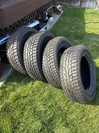 Studded snow tires  P255/65 R18