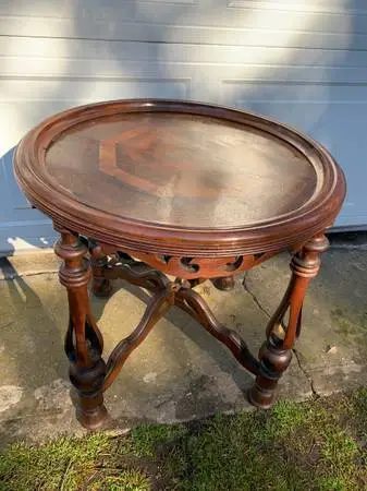 Round antique carved table