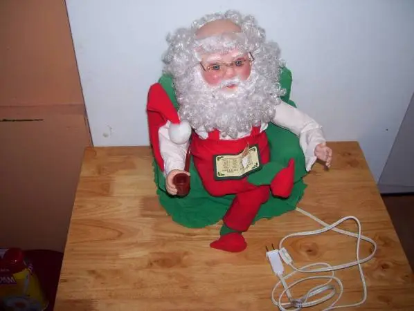 ANIMATED CHRISTMAS SANTA RELAXING IN CHAIR
