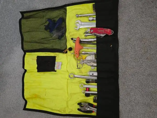 Motorcycle tool roll with tools