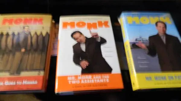 three Monk hard cover books like new