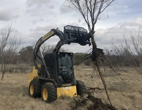 SKID STEER - MESQUITER TREE GRUBBER REMOVES TAP ROOT! WWW.IDIGTX.COM