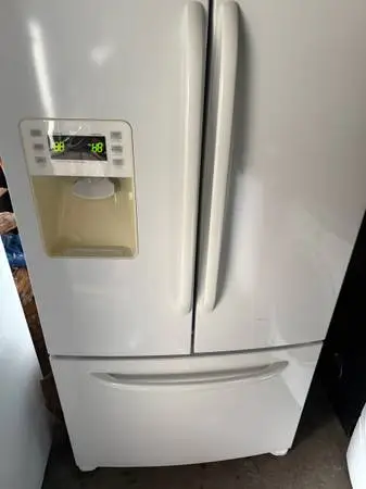 Gloss white ge French door refrigerator clean good working condition