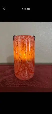 Festive, beautiful, colorful hand blown art glass, thick and tall candle holder