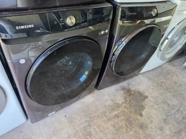 Samsung jumbo black front load washer and gas dryer
