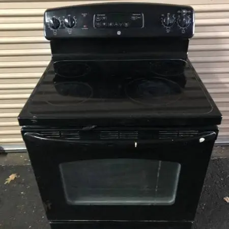 GE Electric Stove, Glass Top, Self-cleaning oven, Works Great