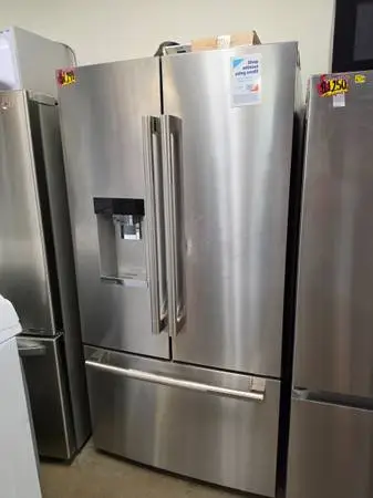 Jenn-Air stainless steel counter depth refrigerator small dent
