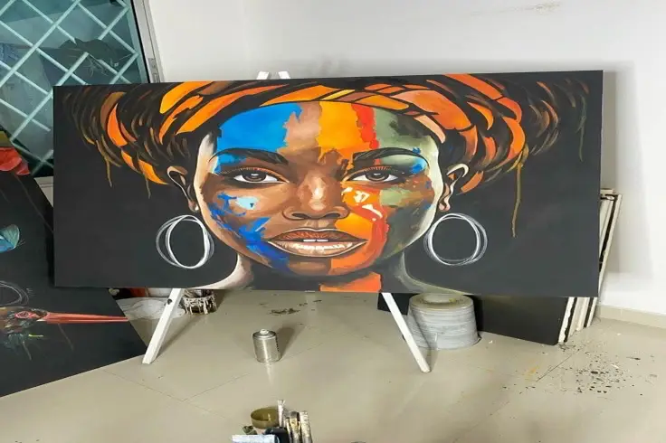 African Woman with Colorful Face Paint and Orange Headwrap Wall Art