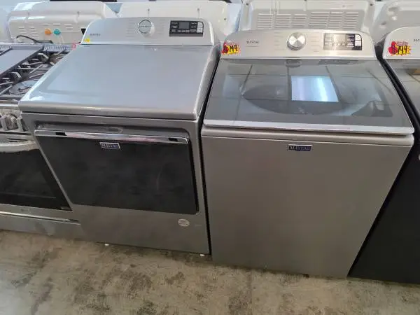 Maytag grey jumbo top load washer and gas dryer