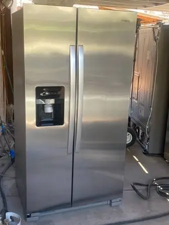 WHIRLPOOL STAINLESS STEEL SIDE BY SIDE REFRIGERATOR