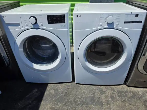 Lg white extra large front load washer and gas dryer