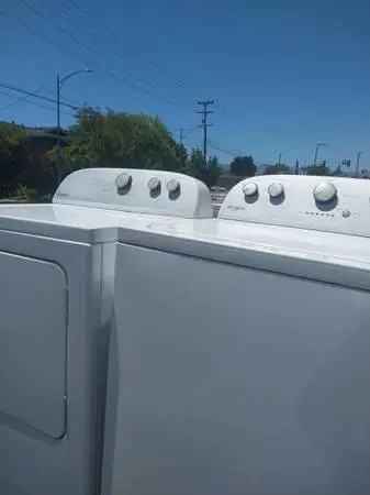 Whirlpool top load washing machine and matching ELECTRIC dryer. 5 yrs