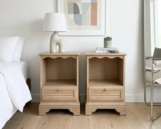 Two wooden scalloped nightstands