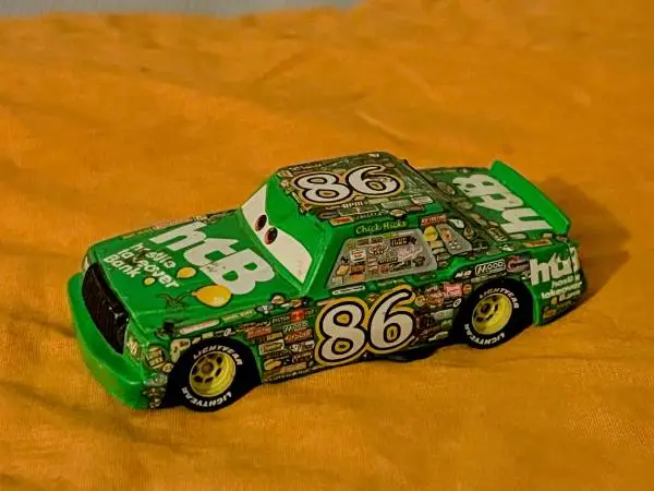 DISNEY PIXAR CARS CHICK HICKS #86 HTB HOSTILE TAKEOVER BANK 1:55 DIECA