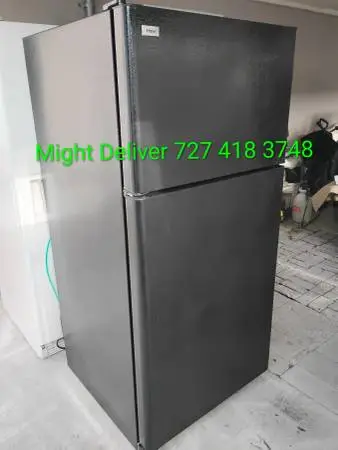Black Fridge/Freezer With Ice Maker-Works Great Very Clean May Deliver