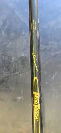 Two 12 foot Shakespeare surf poles