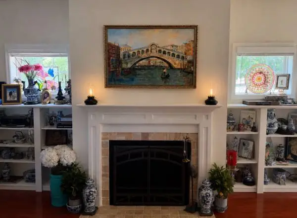 Beautiful framed wall art featuring rich colors and timeless charm. The ornate f
