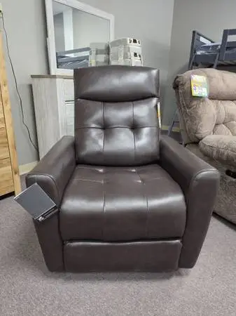 Brand new leather power recliner with powered headrest