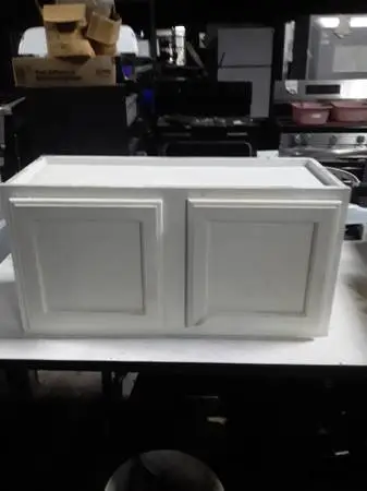 Above stove cabinet. In great condition.