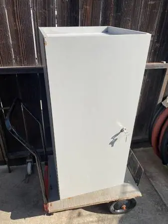Locking cupboard with key